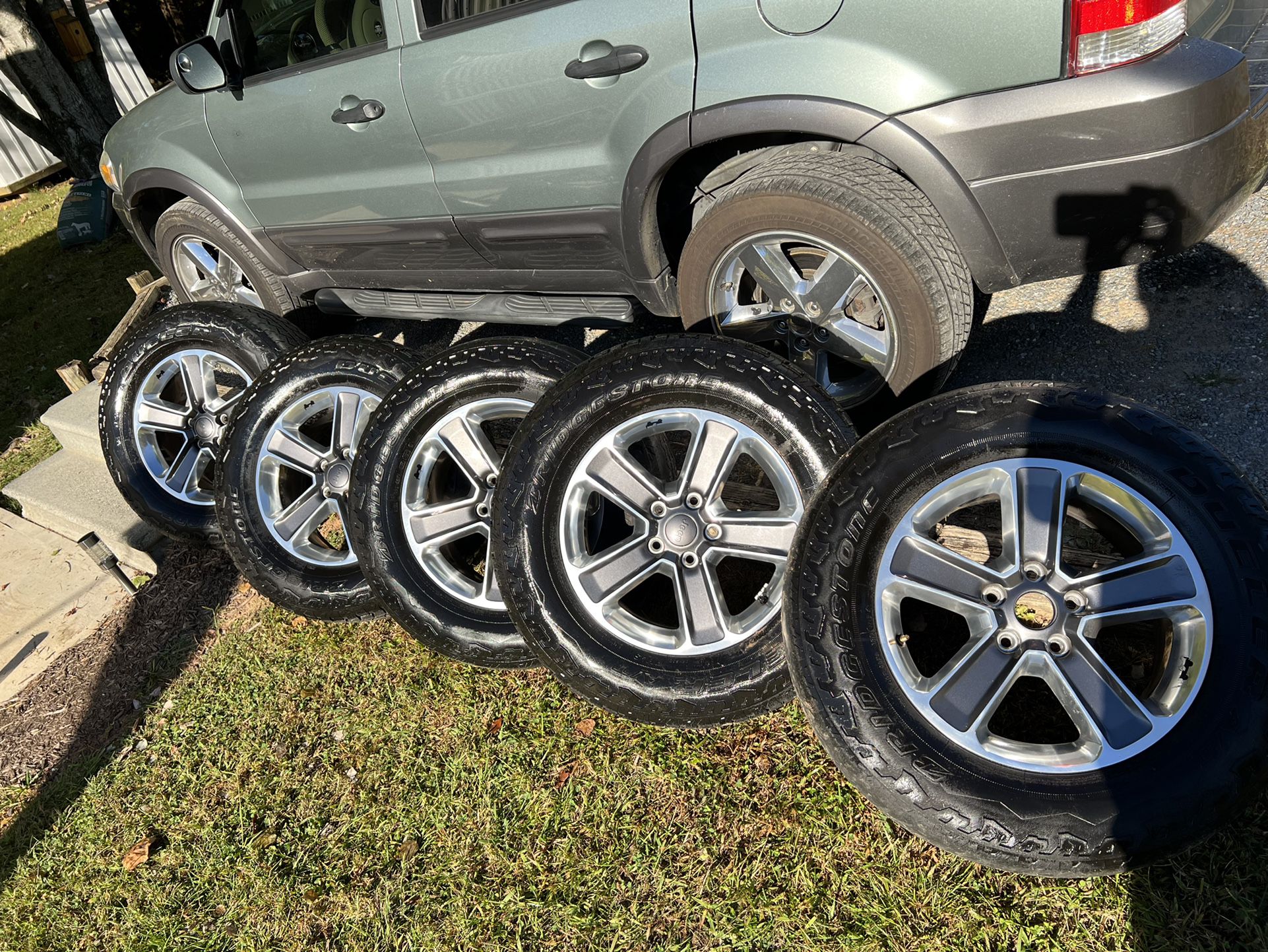 (5) Jeep Sahara Wheels & (5) Bridgestone Tires 