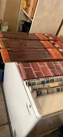 Total of 7 packages and 3 rolled of wall paper
