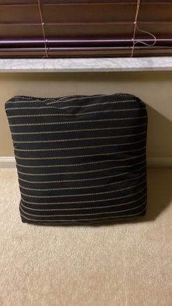 Black and gold striped accessory pillows