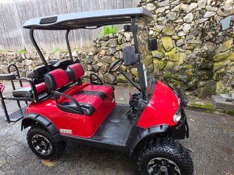 E-Z-GO Red Golf Cart with Rear Seat