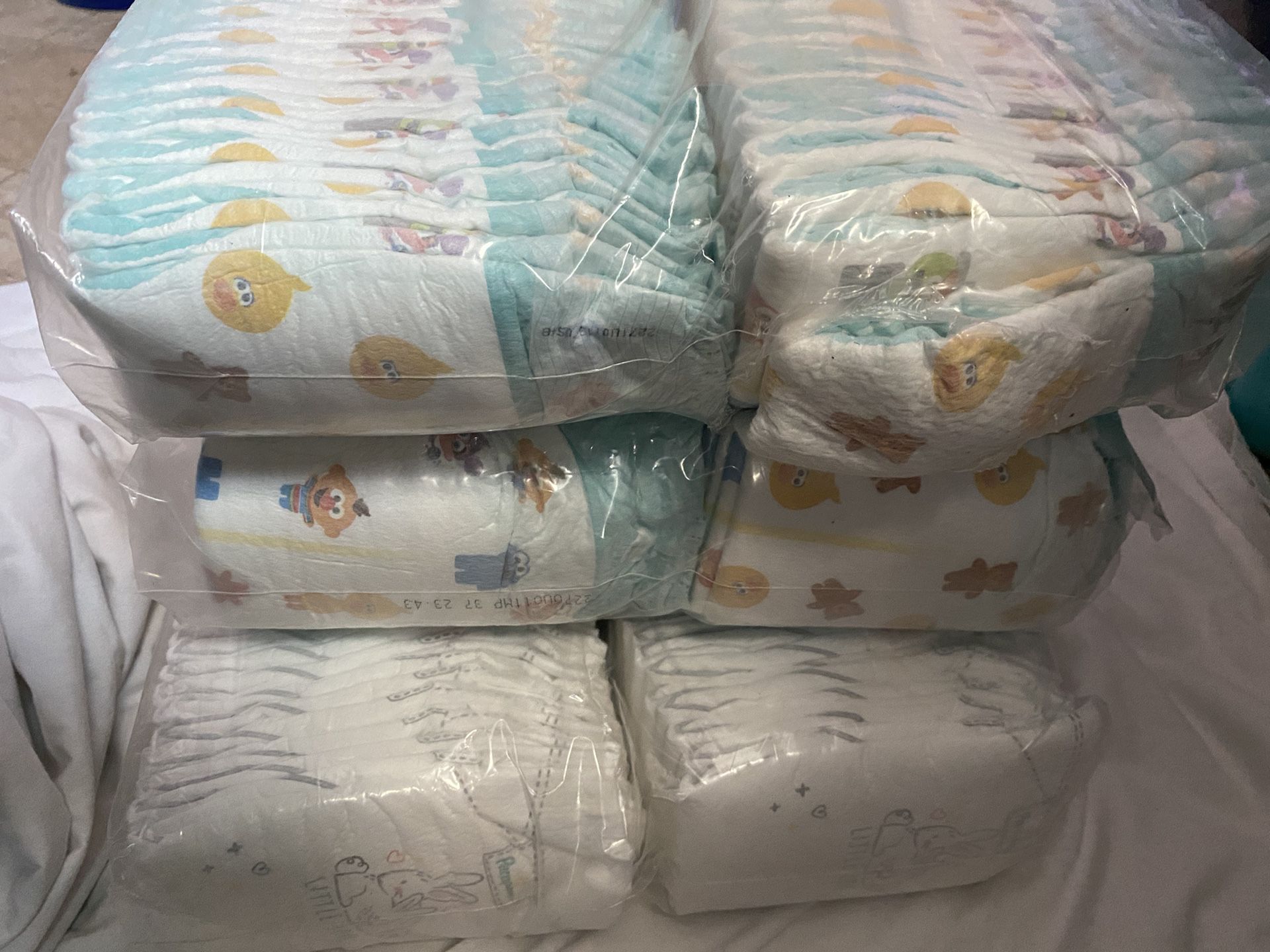 Size 1 Diapers (Swaddle And Regular) Pampers