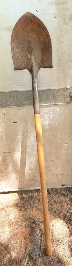 Used Shovel wooden handle
