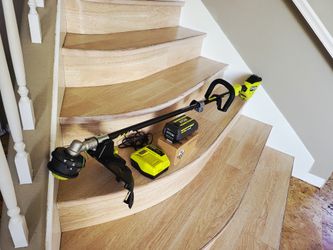 Ryobi 40V HP Brushless 16 in. Cordless Carbon Fiber Shaft Attachment Capable String Trimmer with 4.0 Ah Battery and Charger