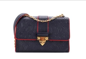 Louis Vuitton
Louis Vuitton Empreinte Crossbody Bag Navy Blue  w Red interior