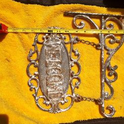 Cast iron, welcome sign.