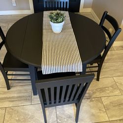 Farmhouse Round Black Table With Four Chairs. 