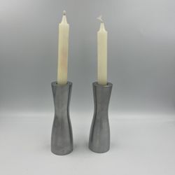Vintage Circa 1990s Modernist / Minimalist style aluminum candlestick holders design by Erika Pekkari Set of 2