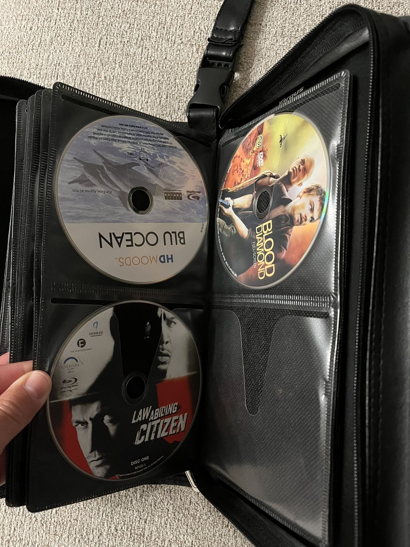 50 Blu-ray DVD Movies And Standard DVDs With Leather Case for Sale in ...