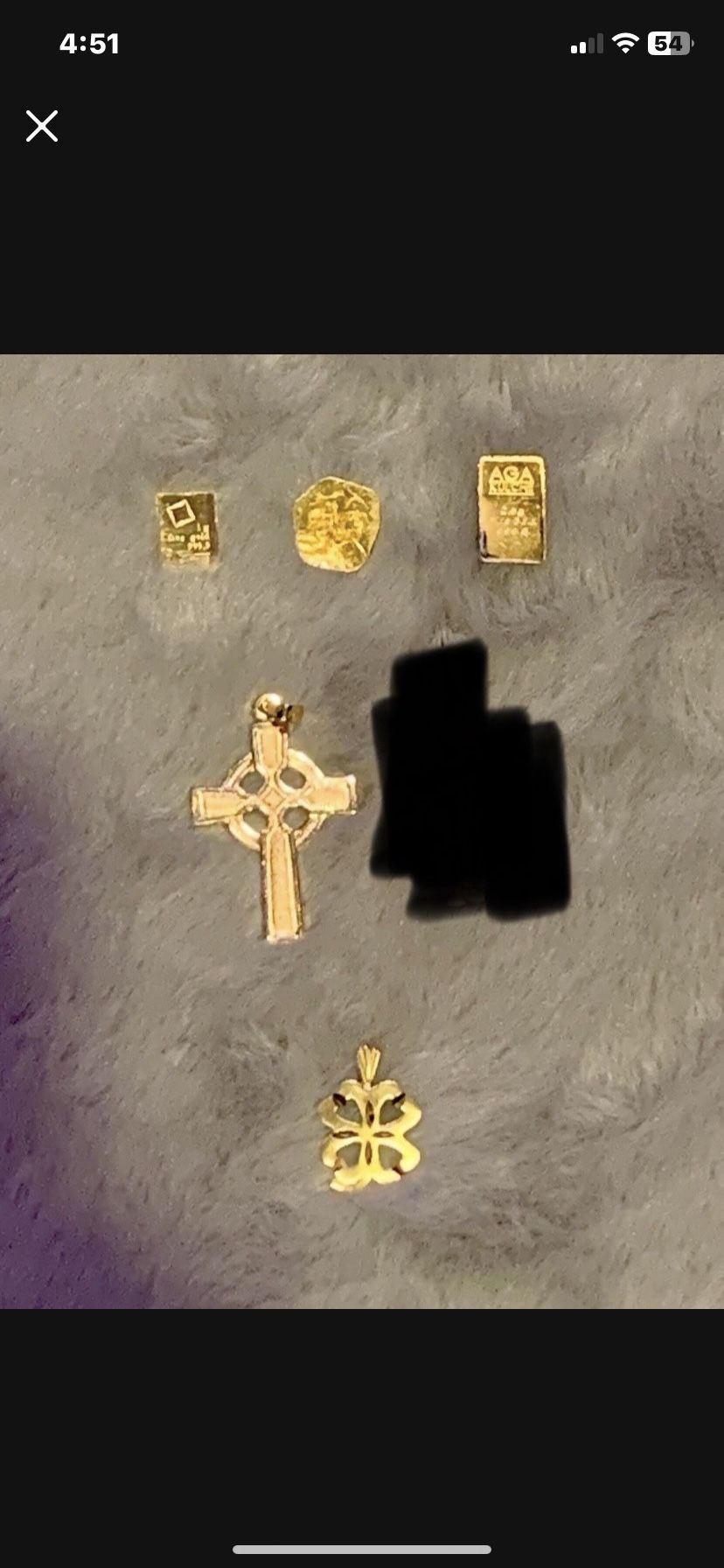 Two 1 gram 24k gold/ A half gram of 24k gold/ 14 k Celtic Cross/ 14k clover
