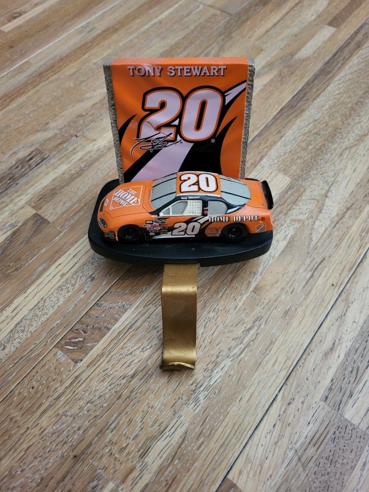 VINTAGE 2004 JOE GIBBS RACING TONY STEWART THE HOME DEPOT DIE CAST RACING CAR W/XMAS STOCKING HOLDER