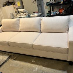 White three seater couch