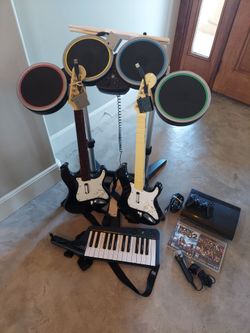Rock Band bundle with PS3 game system Rockband Guitar Hero