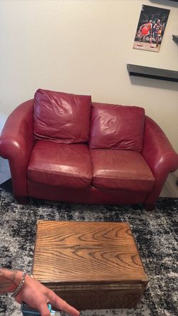 Red leather loveseat – 68” – South Austin pickup