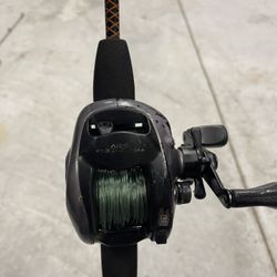 Daiwa Infinite Bait Caster on 5’ Shakespeare Ugly Stilk #7