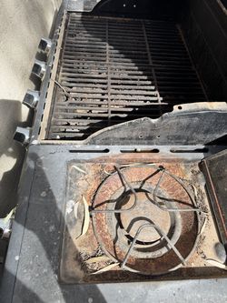 Grill with burner
