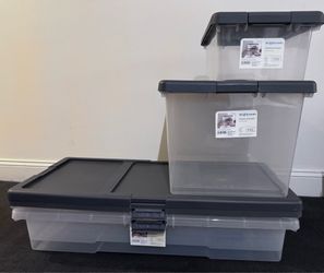 Moving out sale. Set of 4 storage boxes with lid.