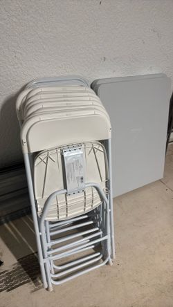 12 folding chairs and 2 foldable tables
