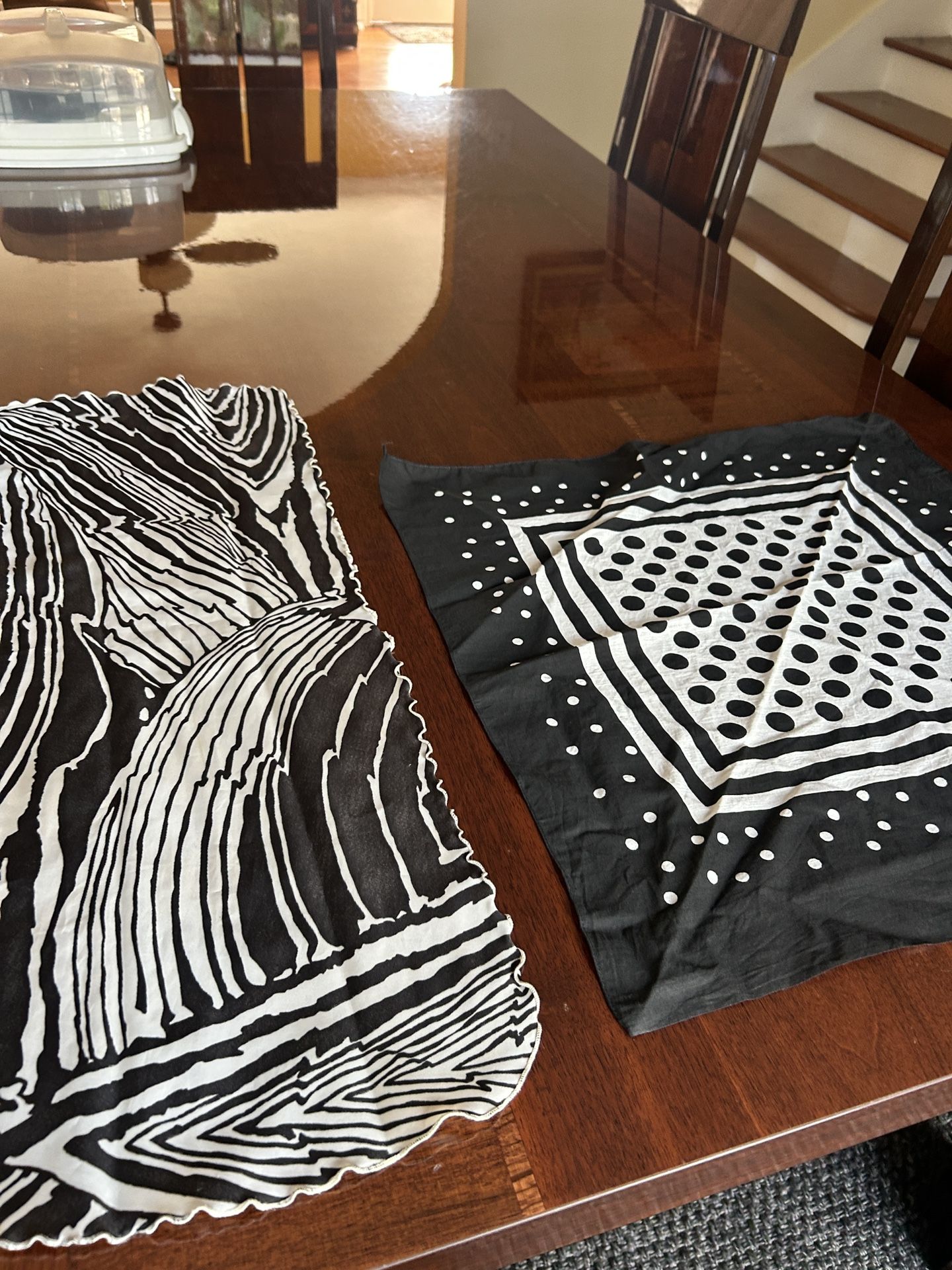 Scarf collection of two black-and-white scarfs 11” x 28” and 21” x 21”