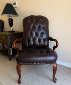 Brown Tufted Leather Accent Chair with Solid Wood Arms