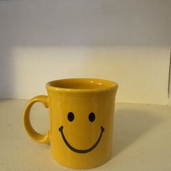 Fun yellow mug with Smiley face on front and “Mary’s morning mix•up”on back