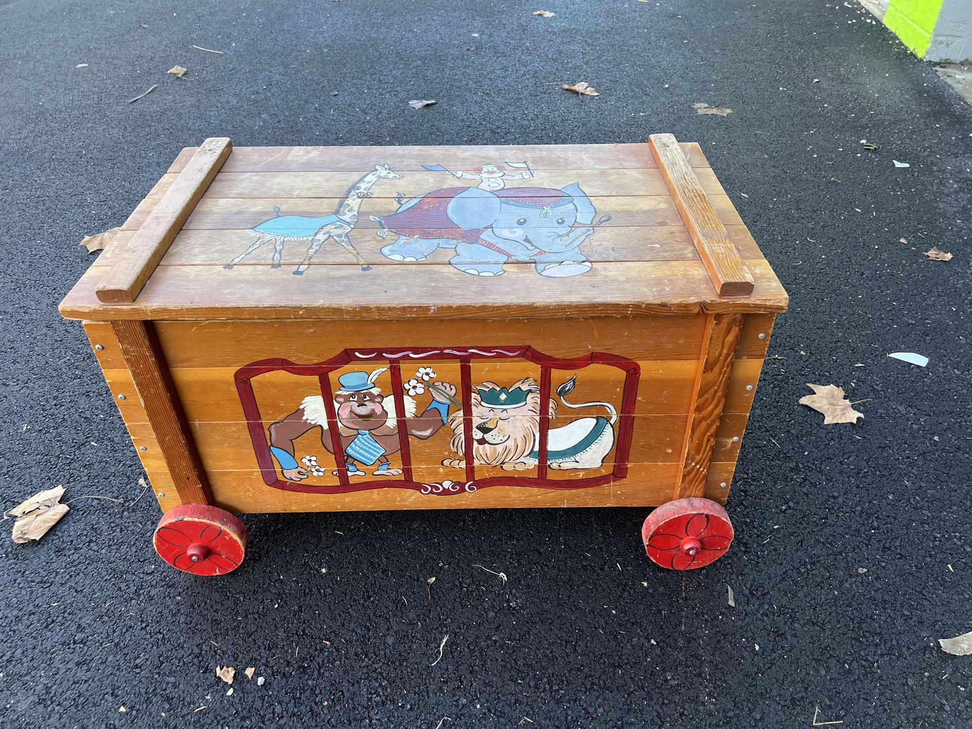 Vintage Large Wooden Toy Box Toy Wagon On Wheels Circus Train Monkey Lion Clowns 32” long  18 3/4” deep  19 1/4” tall 