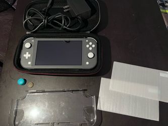 Nintendo Switch Lite, gray w/carrying case and original charger