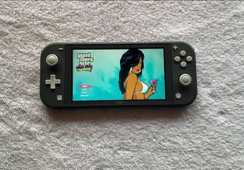 Nintendo Switch Lite + 7000 Games included