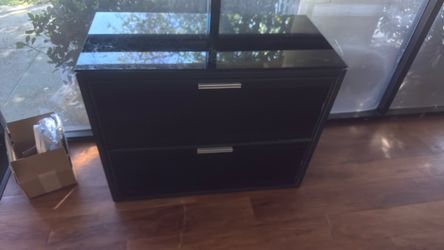 Black. Metal. File cabinet