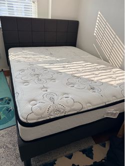 Almost new full bed with mattress together 200$