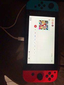 Nintendo Switch With accessories and Mario Cart Game