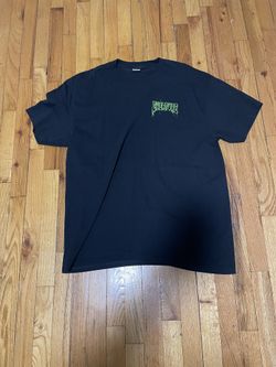 creature black and green tee