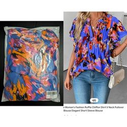 NEVER WORN.  women's ruffle short sleeve blouse size Medium 