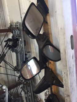 Window regulators and side view mirrors