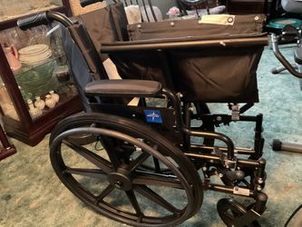 Medline Premium Ultra-Lightweight Wheelchair with Flip-Back Desk Arms and Elevating Leg Rests for Extra Comfort, Black, 22” x 18" Seat