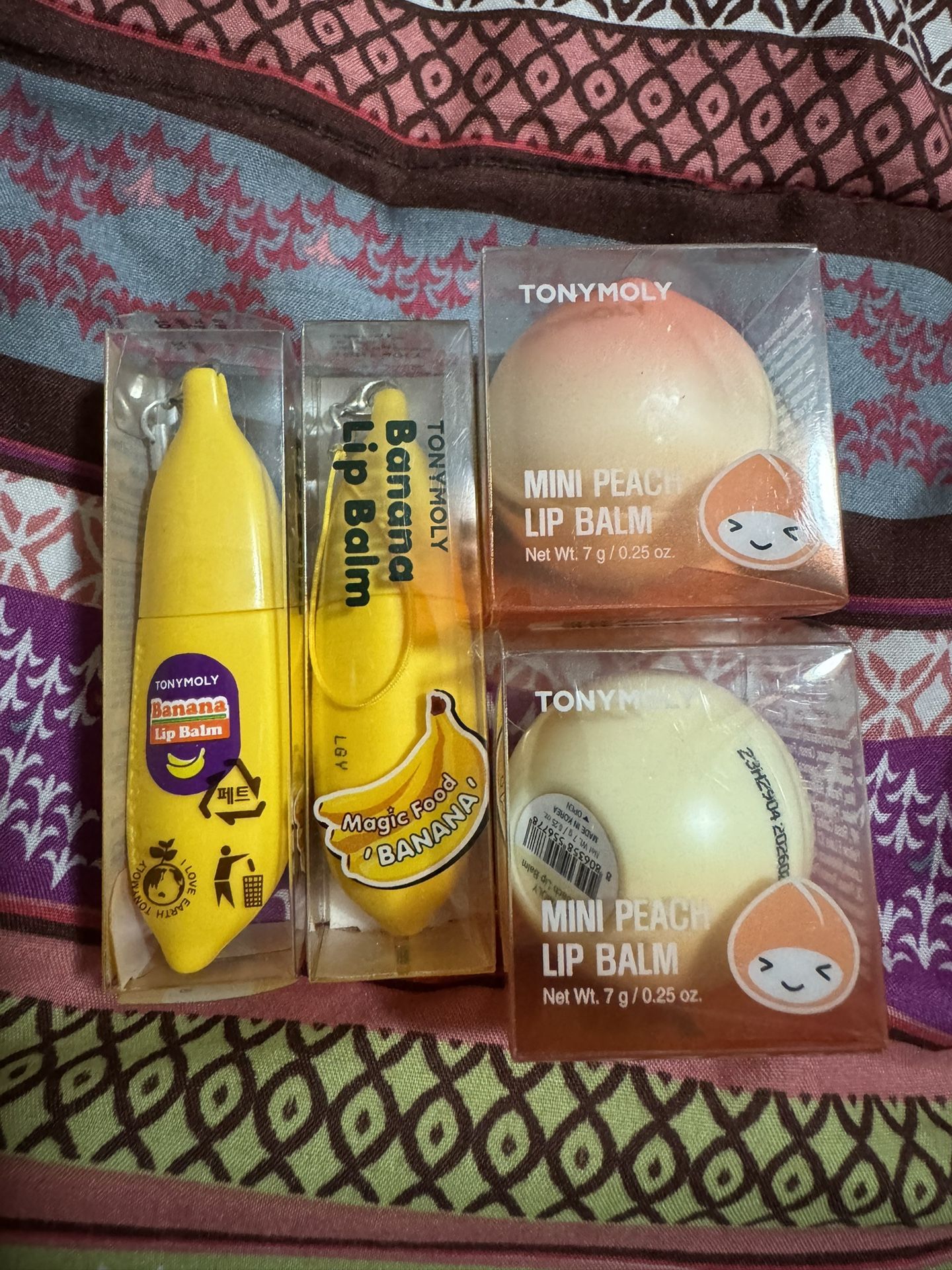 TONYMOLY Banana/Peach Lip Balm Brand New For Sale - Magic Food Banana Lip Balm with Key Chain - Mini Peach Lip Balm 8$ per each 