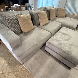 Living Spaces lodge Sectional + Ottoman