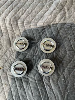 (Set of 4) Genuine Nissan Wheel Center Caps - OEM - 40342-ZM70B