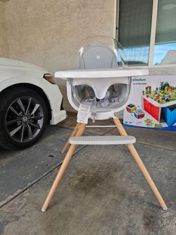 Munchkin 360° Cloud Baby High Chair – $95 obo