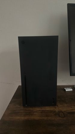 Xbox Series X with 2 controllers