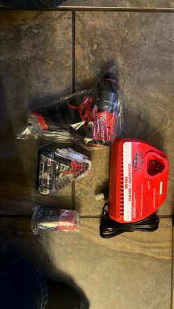 Milwaukee M18 fuel drill and batteries new