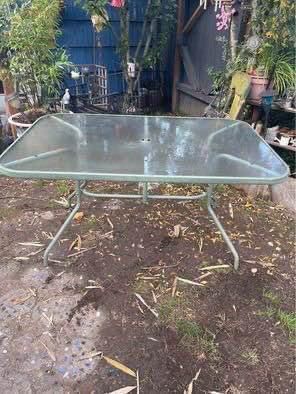 patio outdoor garden table rectangle. $25 Measurements are in the pictures. some rust.  cash only Everett/Melvin ave pick up area.