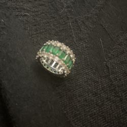 Diamond and emerald eternity ring simulated