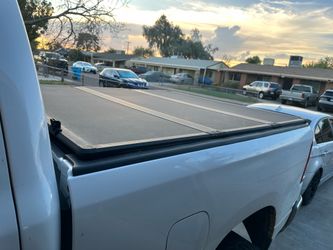 Hard tri fold bed cover for Ram with 6’4” bed