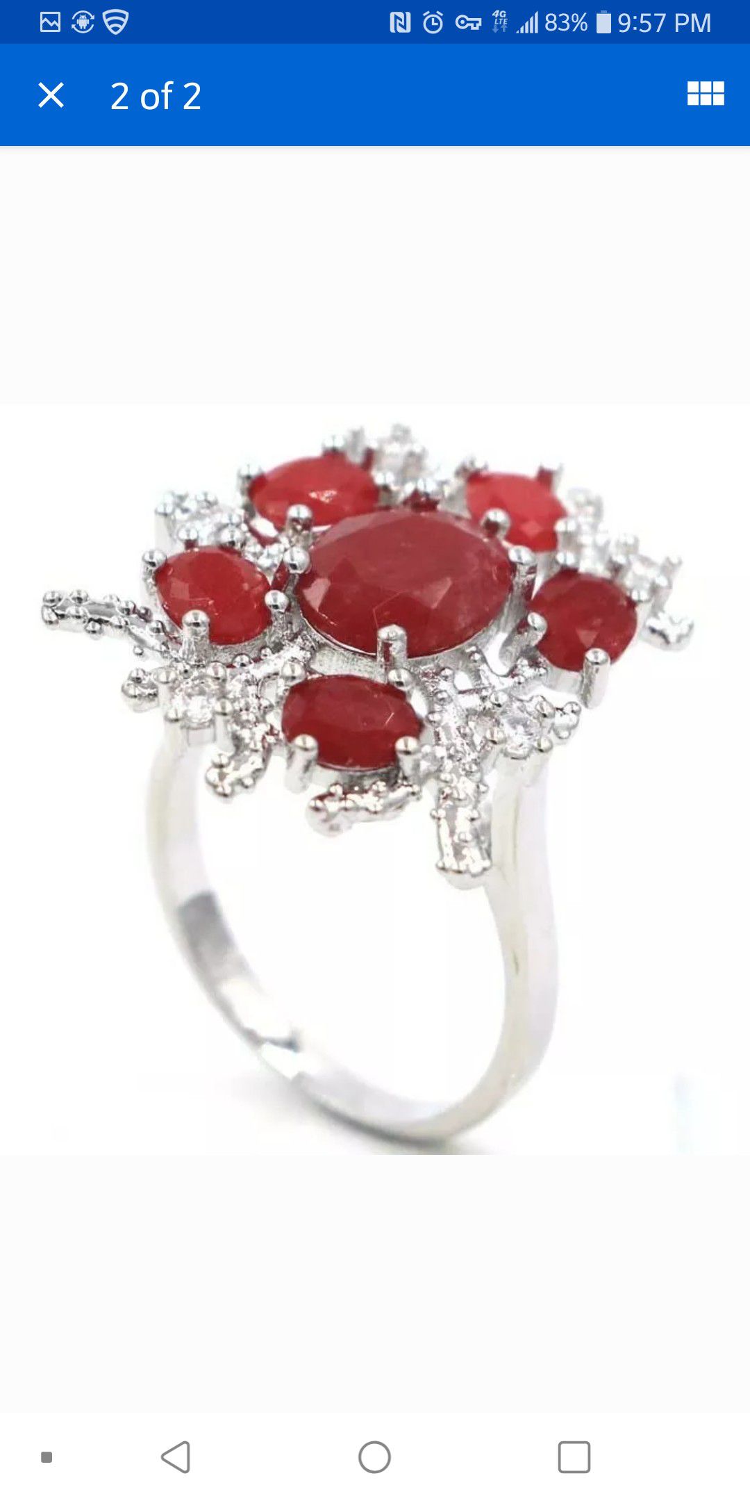 Beautiful genuine Ruby with created Sapphire silver filled ring size7.25. Has a high setting
