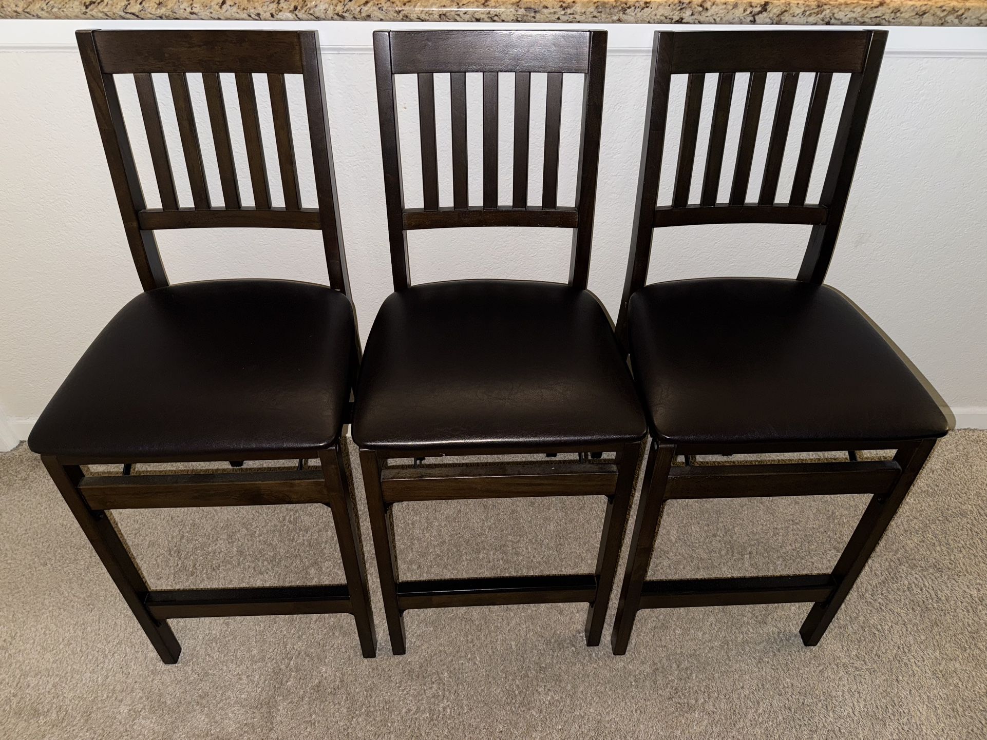 Three Folding Wooden Chairs