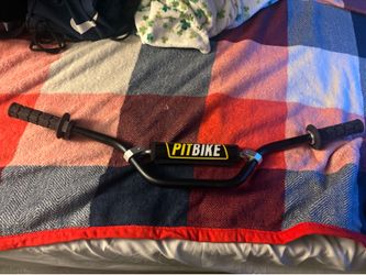 Pit bike handle bar with odi grips