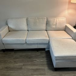 Beige couch with ottoman that has storage! 
