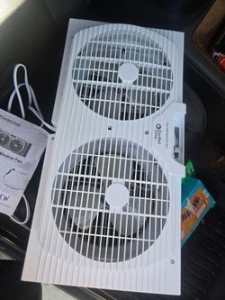 Double window fan with slide out spacers