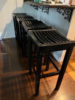 4 solid wood stools $35