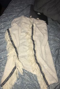 KNITTED PONCHO